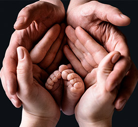 Photo of hands in the shape of a heart